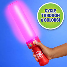 Light-up musical drumstick, red body with pink glowing tip in hand