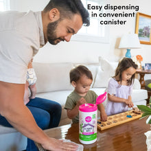 Dapple all-purpose wipes canister on table as family wipes hands during home play