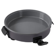Gray electric ceramic skillet with side handles and open interior pan