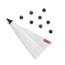 White piping bag with fitted nozzles and remaining tips for Dash egg cooker
