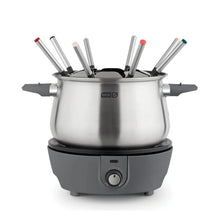 Stainless steel fondue pot with black insert and upright mixed-color fondue forks