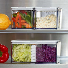 Prep deck container set with chopped vegetables and shredded cabbage inside