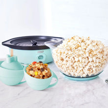 Mint Dash SmartStore stirring popcorn maker with black base, large popcorn bowl, and snack cup