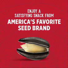 Roasted sunflower seed shells on red package with snack banner text