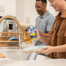 Dish soap bottle with blue Dawn Platinum Clean Lemon and EZ-SQUEEZE nozzle.