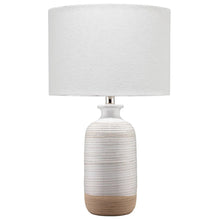 Dayla table lamp with textured ceramic base in light gray and tan, white drum shade