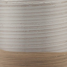 Ribbed ceramic lamp base texture in white with tan bottom band