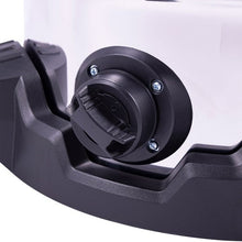 Wet/dry vacuum lower corner with black circular inlet fitting and mount bracket