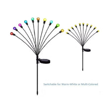 Two solar firefly lights with multi-color globe bulbs on slim black stake stems