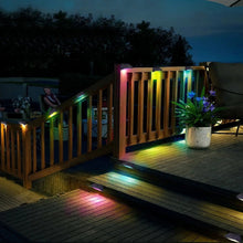 Solar deck and wall lights on a railing with multicolor RGB glow