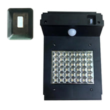 Black solar wall light with frosted LED array and round motion sensor