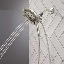 Hand shower with round spray head and water stream, chrome finish, flexible hose