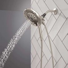 Hand shower with round spray head and water stream, chrome finish, flexible hose