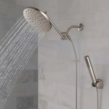Chrome shower head and hand shower with flexible hose, water pouring