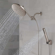 Chrome rain shower head with hand shower on slide bar, water spraying