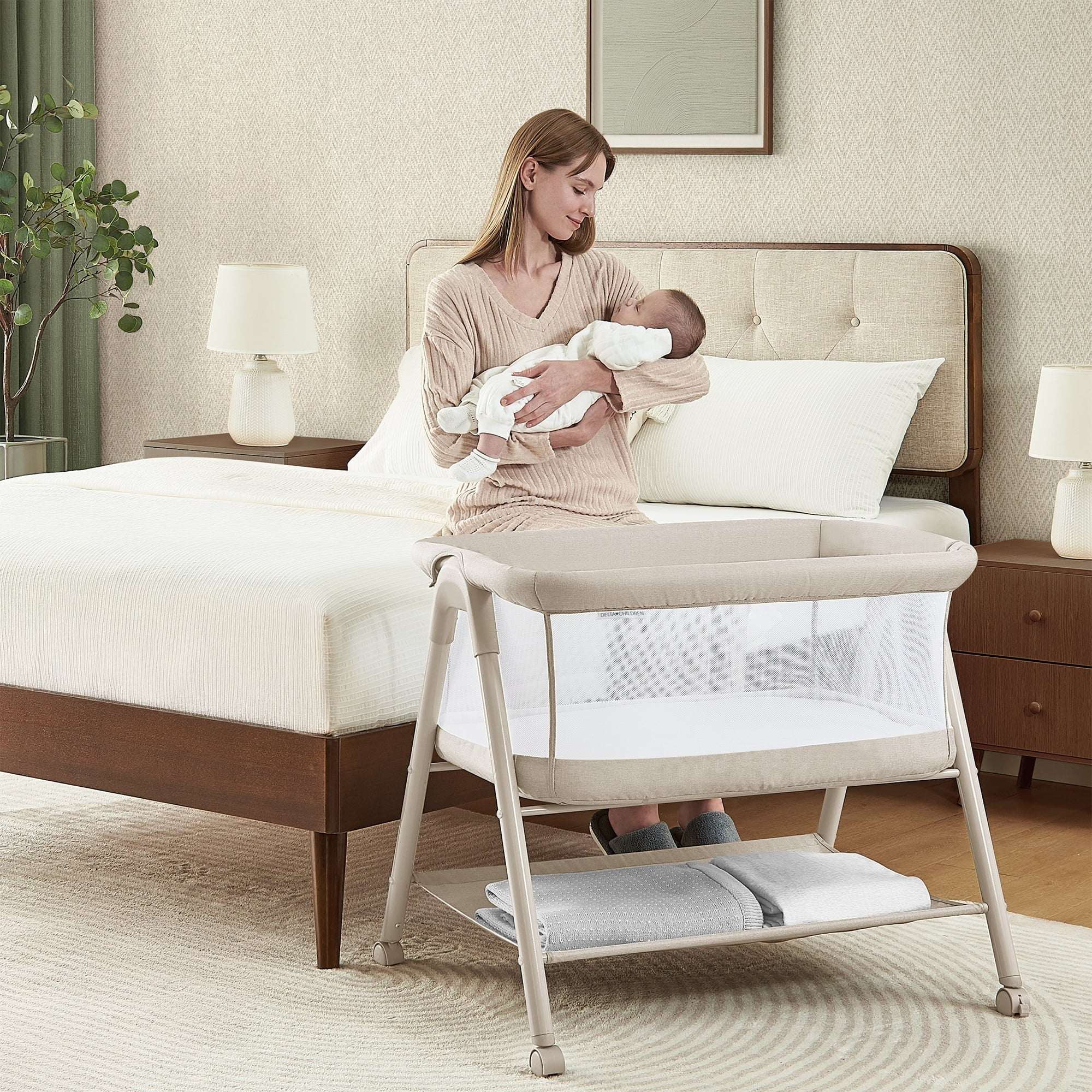 Delta Children Haven AirFlow Bassinet with Breathable Mesh and Wheels, Tan