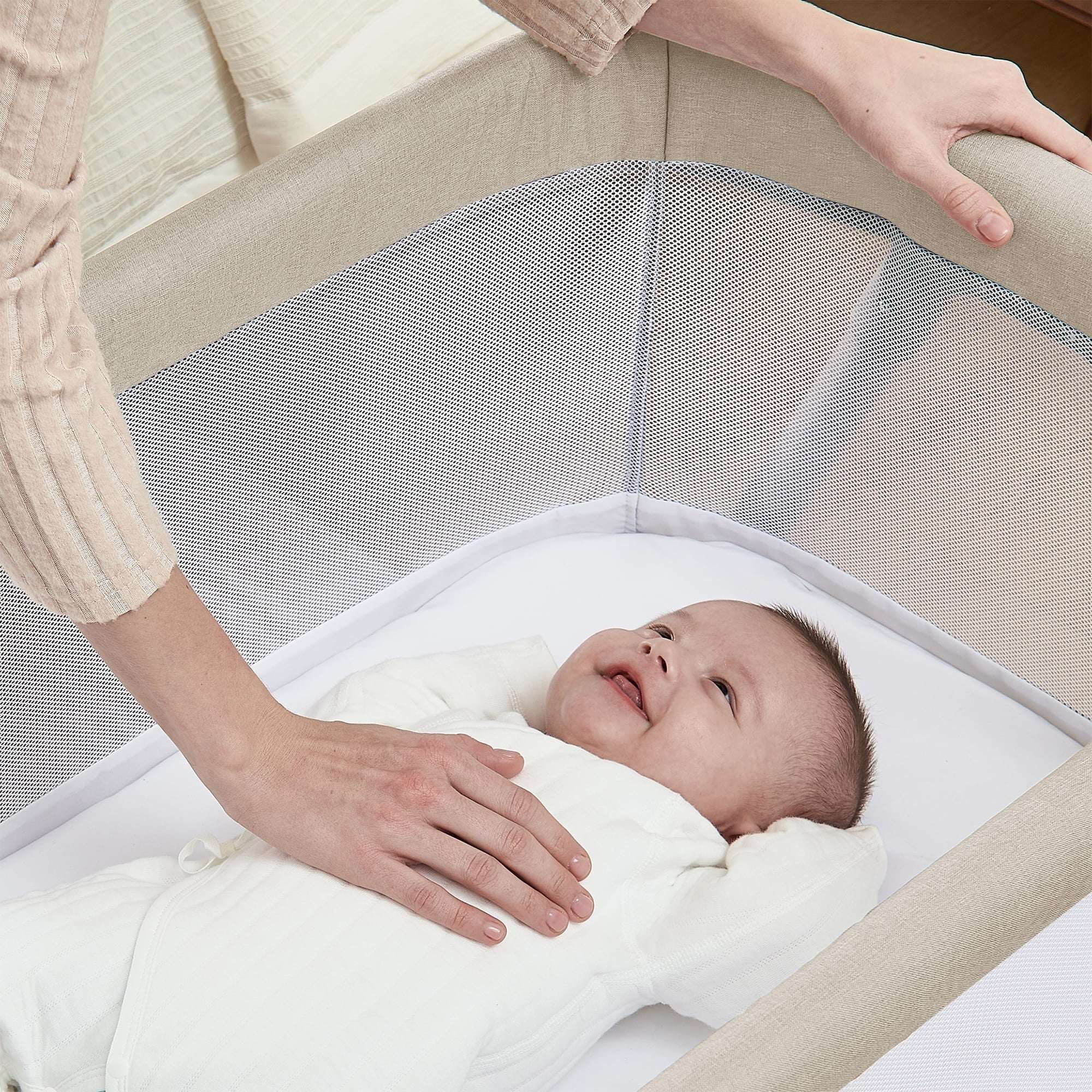 Delta Children Haven AirFlow Bassinet with Breathable Mesh and Wheels, Tan