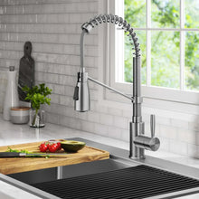 Pull-down kitchen faucet with high arc spout, single handle, and stainless finish