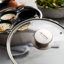 Stainless steel egg poacher lid with Demeyere logo and knob