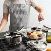 Stainless steel egg poacher set with four nonstick cups and lid