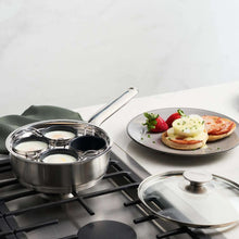 Stainless steel egg poacher set with four cups and glass lid