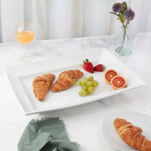 White rectangular stoneware platter with raised rim