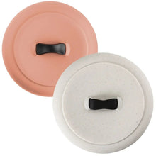 Tortilla warmer lids: white speckled lid and terra-cotta lid with black handles