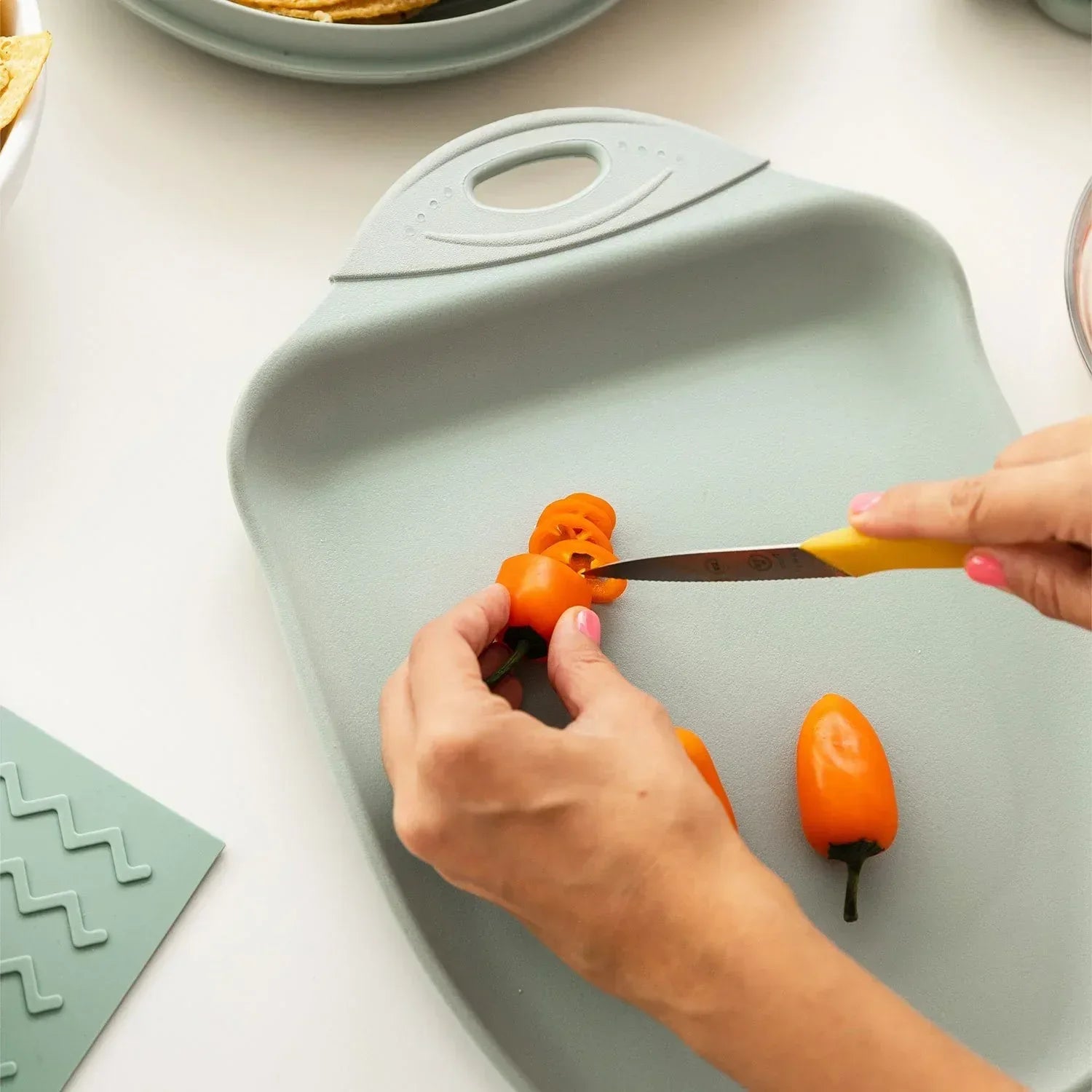 Dexas 2-Pack Over the Sink Strainer and Chop & Scoop Cutting Board, Choose Color