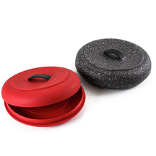 Tortilla warmer lids in red and dark granite speckle, each with a black handle