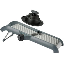 Adjustable chef’s mandoline slicer with blade dial, serrated cutting edge, and grip stand