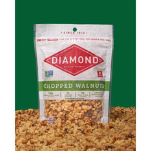 Chopped walnuts 8 oz bag standing with scattered chopped nuts around