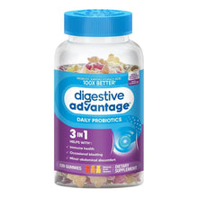 Probiotic gummies bottle with blue cap and mixed fruit gummy pieces in jar
