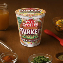 Cup Noodles turkey dinner ramen noodles cup with lid, front label and brand graphics