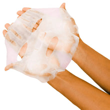Hydrating silk sheet mask in hands, translucent sheet