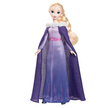 Elsa fashion doll in a purple off-shoulder dress with a white faux-fur collar