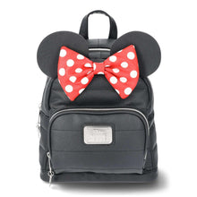 Black mini backpack with large red polka-dot bow and front zip pocket