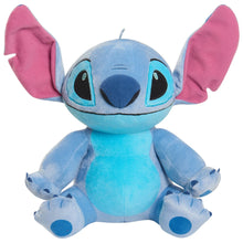 Light blue Stitch plush toy with pink ears, big black-and-teal eyes, open stance