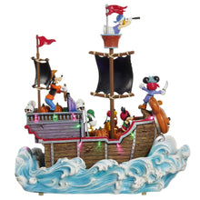 Pirate ship figurine with glowing deck lights, Mickey & Donald characters, and blue waves