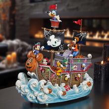 Halloween pirate ship figurine with Mickey sail, Donald, pumpkins, and wave base