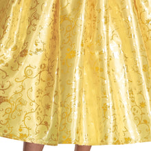 Golden satin skirt fabric with decorative vine pattern and gathered pleats