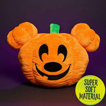 Orange Mickey pumpkin head plush with green stem and stitched black smile face
