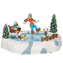 Disney holiday village ice rink accessory with character figures and icy blue water on snowy platform
