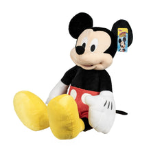 Large Mickey Mouse plush toy with hang tag, black head, red shorts, white gloves, yellow feet