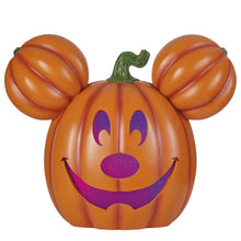 Orange Mickey jack-o-lantern pumpkin with purple glitter eyes, nose and smile