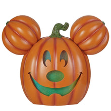 Orange Mickey jack-o-lantern pumpkin with green glitter eyes, nose and grin