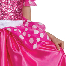 Pink satin skirt with polka-dot tulle overlay and bow detail at hem