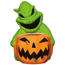 Oogie Boogie-style treat bowl in green with a stitched grin and orange pumpkin front
