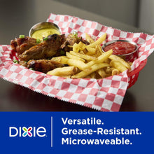 Red and white checkered food wrap and liner holding fries and chicken