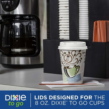 Hot to-go cup with white domed snap-on lid on a counter