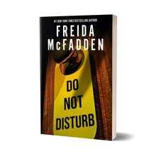Paperback book in 3/4 view with yellow "DO NOT DISTURB" sign and Freida McFadden name
